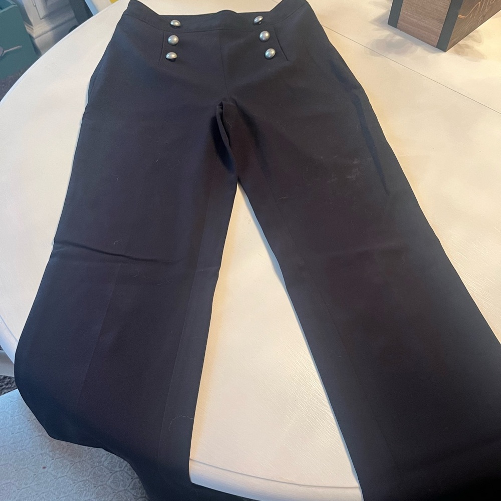 Venus Black flare dress pants with side zip and button details on front. Size 2